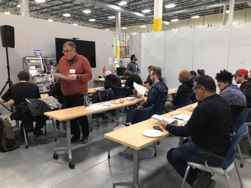 Design Ready Controls employees attending an onsite Hennepin Tech class.